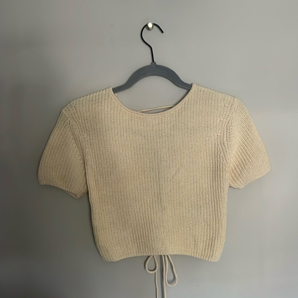 cream short sleeve sweater with lace up back